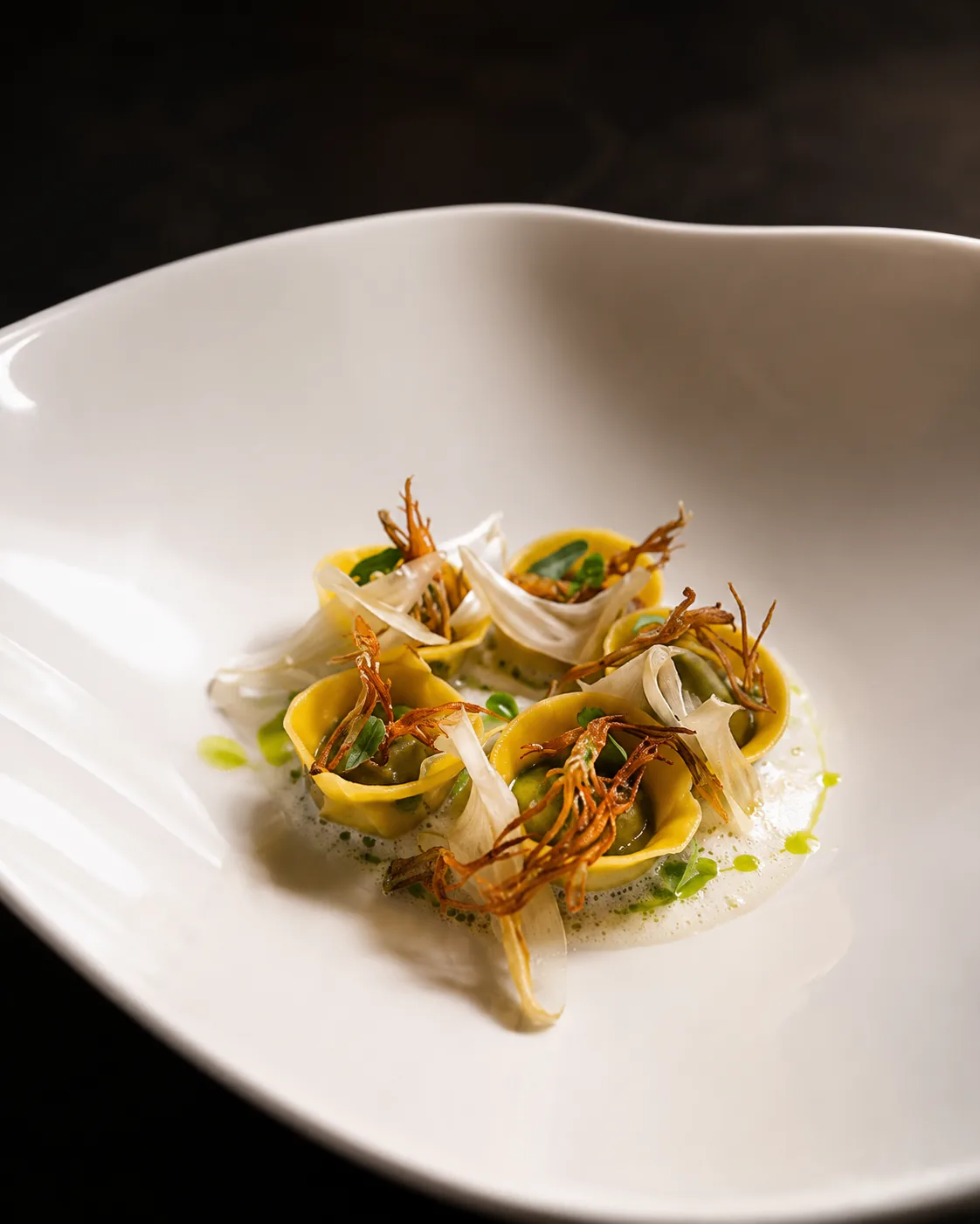 Tortellini with artichoke crisps and light espuma