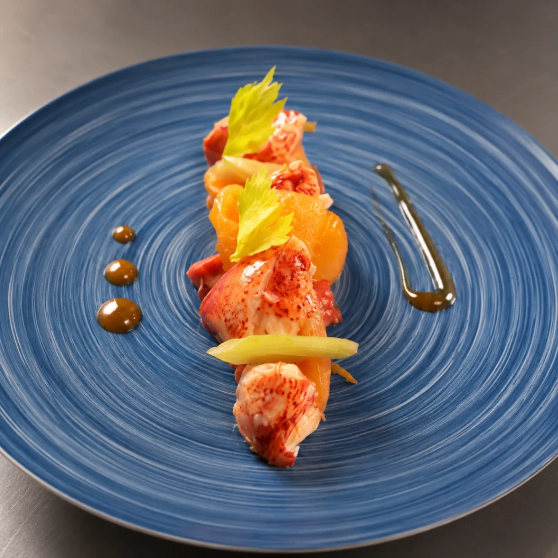 Poached lobster with apricot and celery
