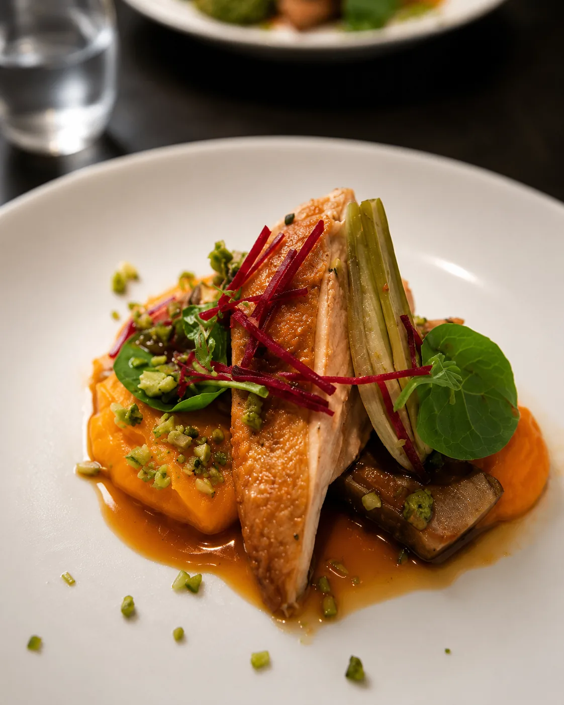 Crispy-skinned fish with sweet potato, beetroot, and greens